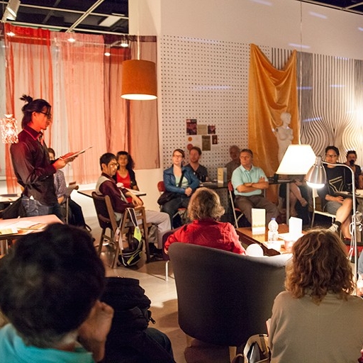 People gathered in a session of University of the Streets Café