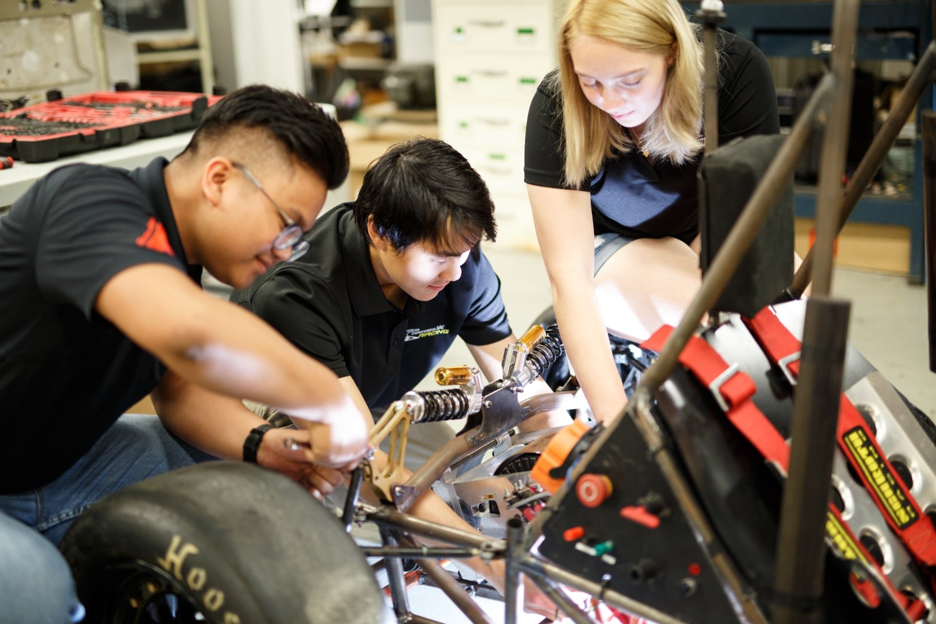 Students working on an electric car