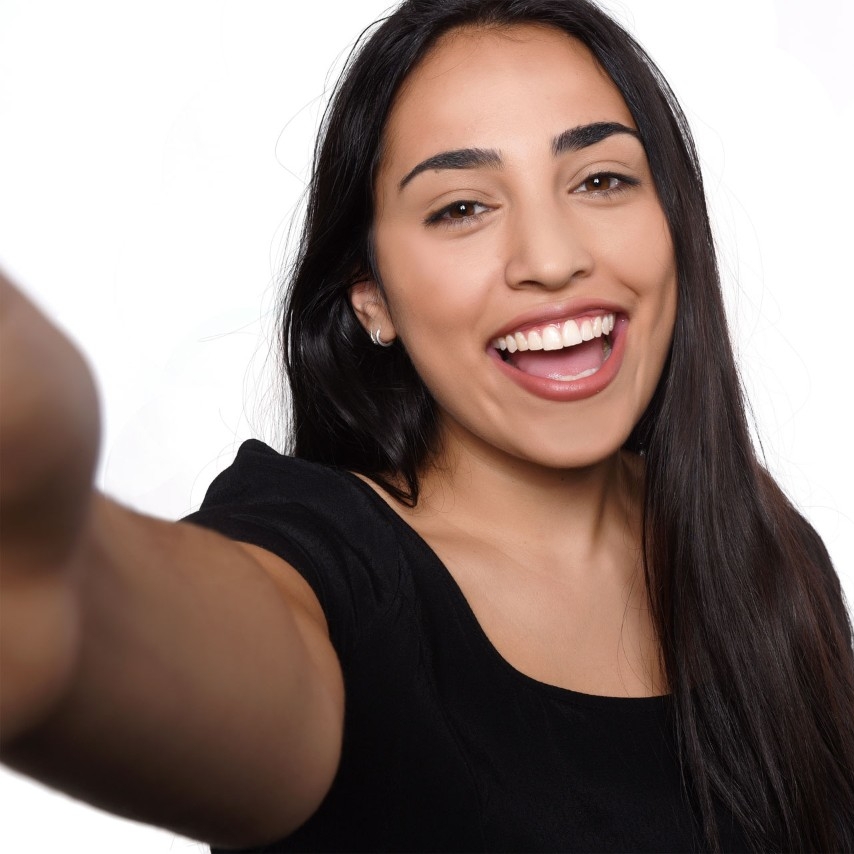 Taking a selfie showing arm.