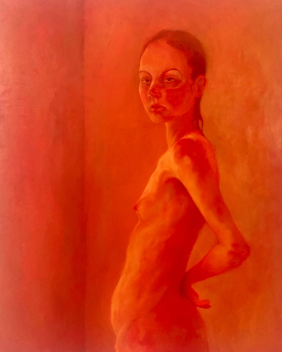 Close up image of the painting (Out)Body. A naked non-binary human is posing in an empty red room which we can only see a corner section. There facial expression is defiant.