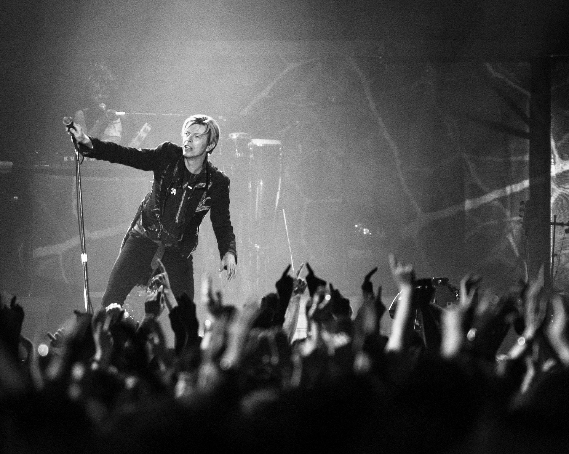 David Bowie performing in concert