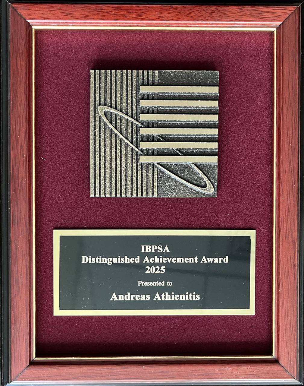 Dr. Athienitis received the 2025 IBPSA Distinguished Achievement Award<