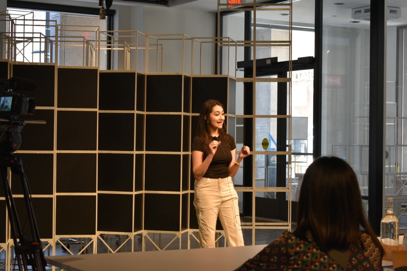 A student in the middle of an animated presentation