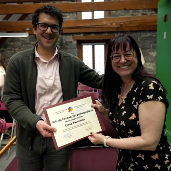 Photo of Linda Touchette receiving her certificate from David Waddington