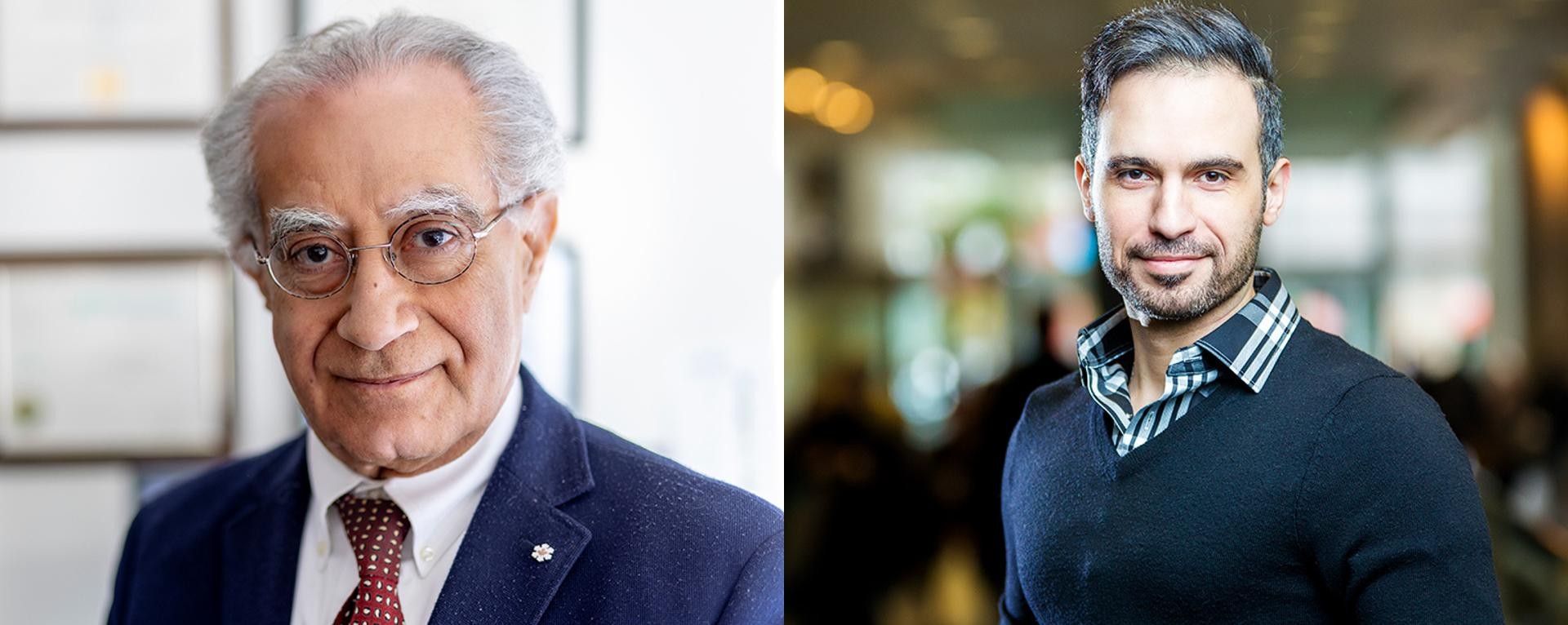 Side-by-side portraits of two individuals. On the left is an older gentleman with white hair and glasses, wearing a dark blue suit and a red tie. On the right is a younger man with short dark hair and a beard, wearing a black sweater over a plaid shirt. Both are smiling slightly and looking directly at the camera. The background is blurred.