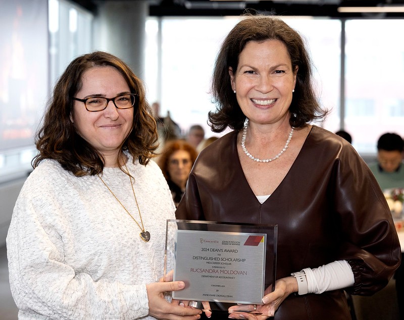 Distinguished Scholarship: Mid-Career Scholar award-winner Rucsandra Moldovan poses with Dean Anne-Marie Croteau at the 2024 John Molson School Dean's Awards