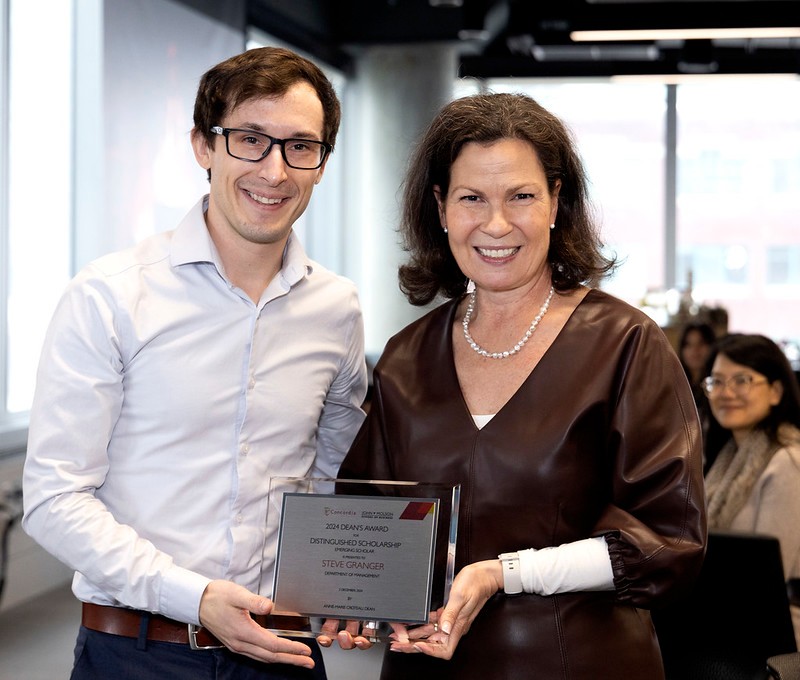 Distinguished Scholarship: Emerging Scholar Award-winner Steve Granger poses with Dean Anne-Marie Croteau at the 2024 John Molson School Dean's Awards