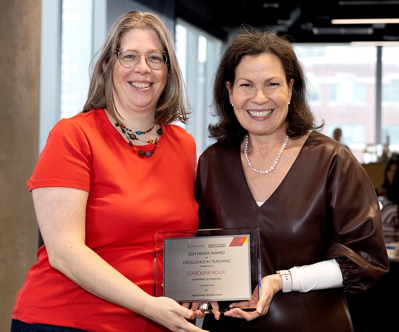 2024 Dean's Award Winner for Excellence in Teaching, Caroline Roux, posing with Dean Anne-Marie Croteau