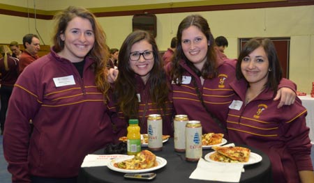 Erika Ikonomopoulos and fellow members of the Stingers rugby team